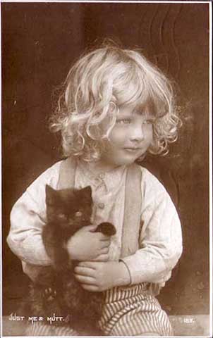Postcard of little boy with cat